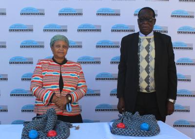 Kgosi Mosadi Seboko, Paramount Chief of Balete and Bishop Habibo of the Gaborone Assembly of God conducting randomisation for Potlako Plus Study