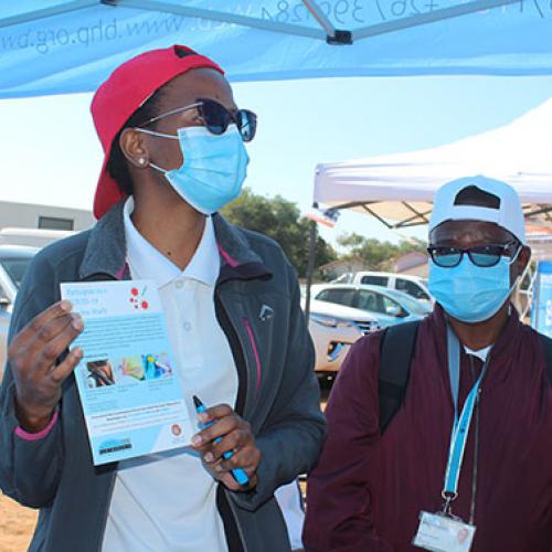 CoVPN 3008 Study Coordinator, Dr Alice Serututshi (left) explaining what the study is all about