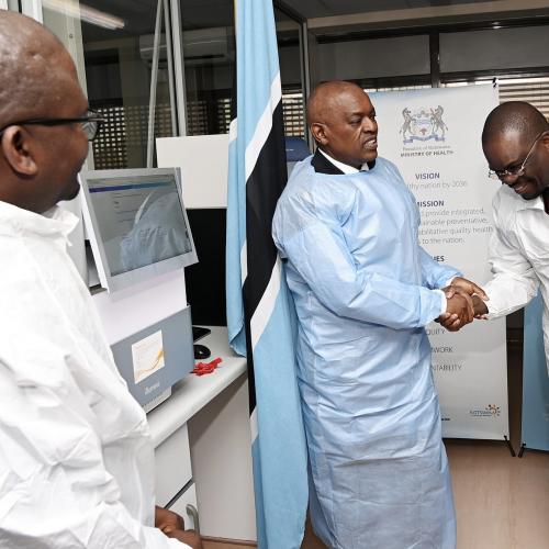 President Masisi shaking hands with Africa CDC Director General, Dr Jean Kaseya