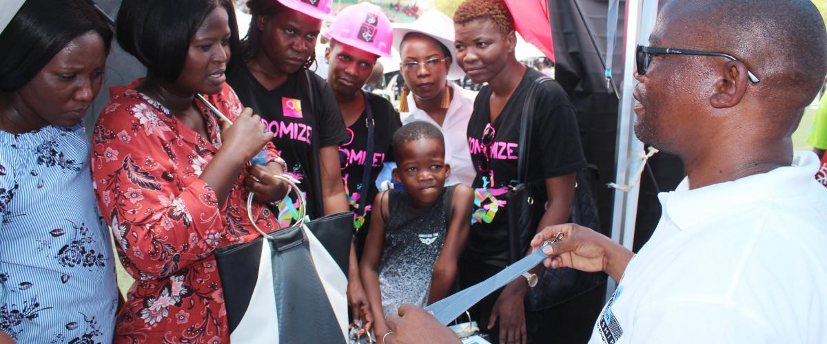 BHP Community Engagement Coordinator, Ernest Moseki engaging with members of the publict at World AIDS Day in Maun